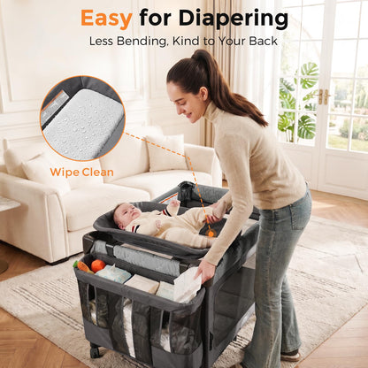Pamo Babe 7-in-1 Pack and Play with Bassinet & Changing Station